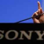 The right hand of Sony Corp’s new President and CEO Hirai is seen above the company’s logo during a news conference at the company headquarters in Tokyo